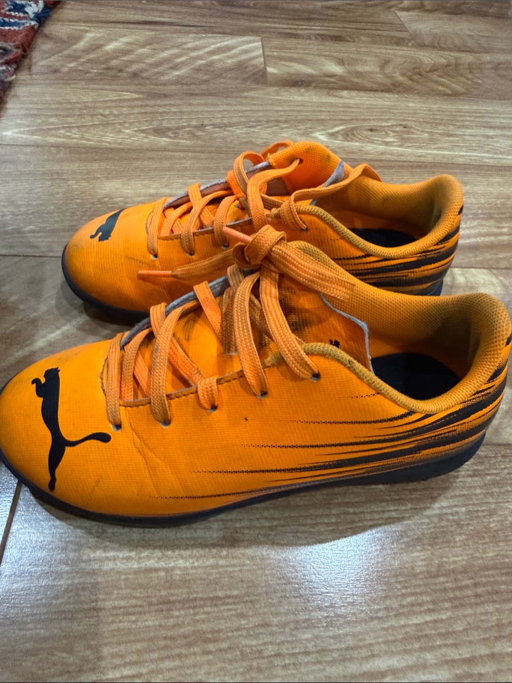 Puma Kids Orange Low-Top Sneakers with Black Logo cleats